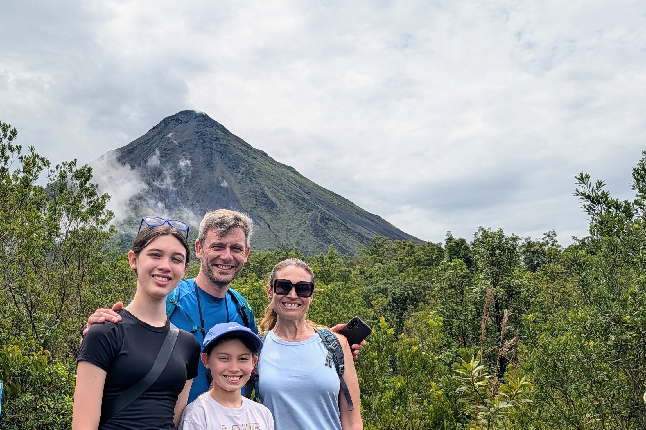 Family of four at Arenal Volcano near La Fortuna, Costa Rica